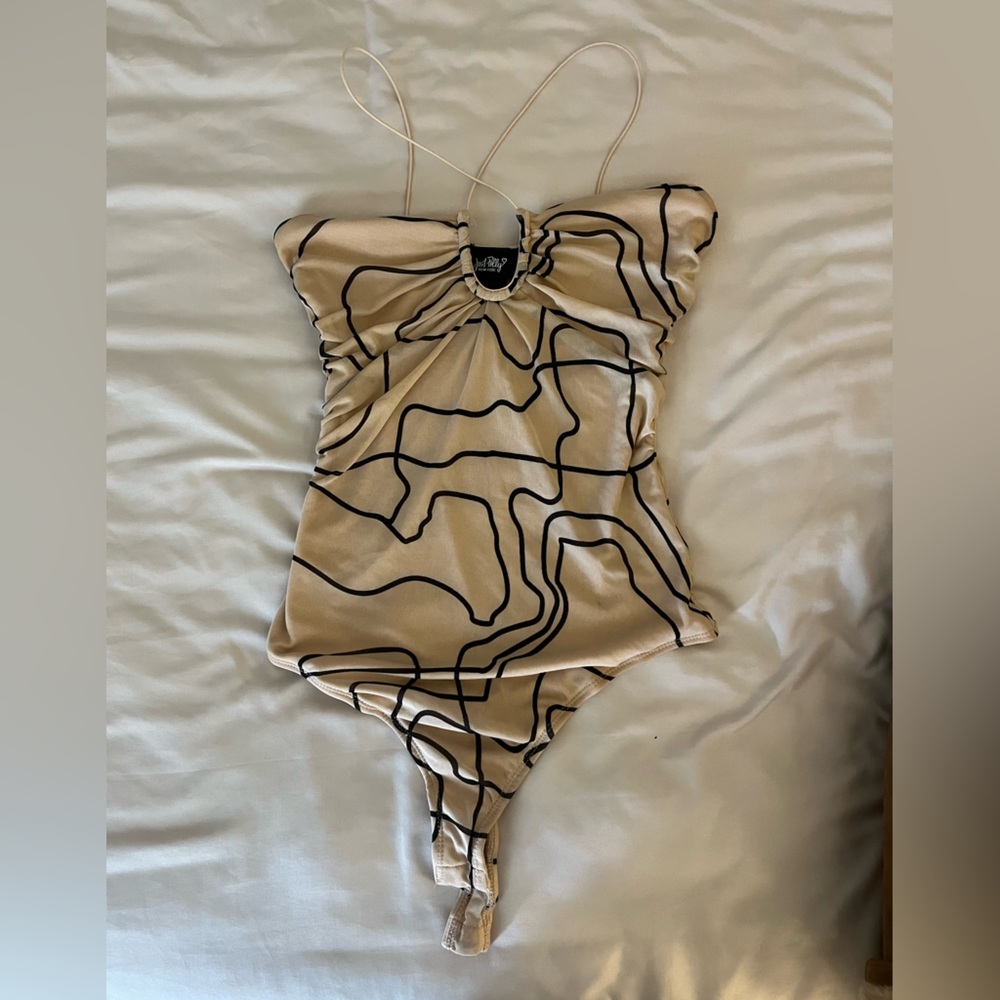 Patterned body suit